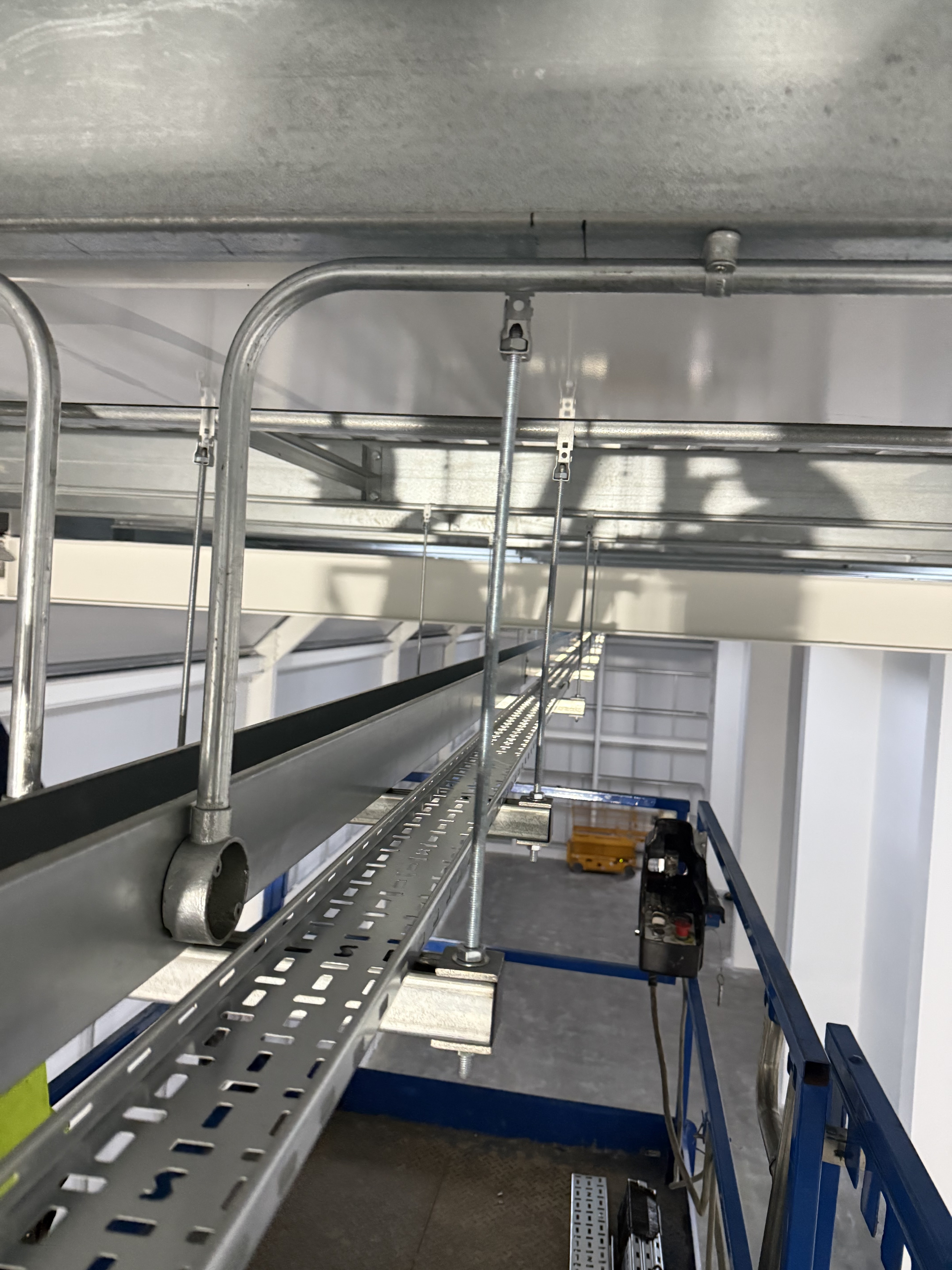 Electrical rewiring cables and conduit in a Surrey residential property